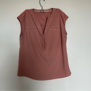 Eden Ruth Elegant Sleeveless Flowy Blouse in Dusty Pink with V-neck and Buttons